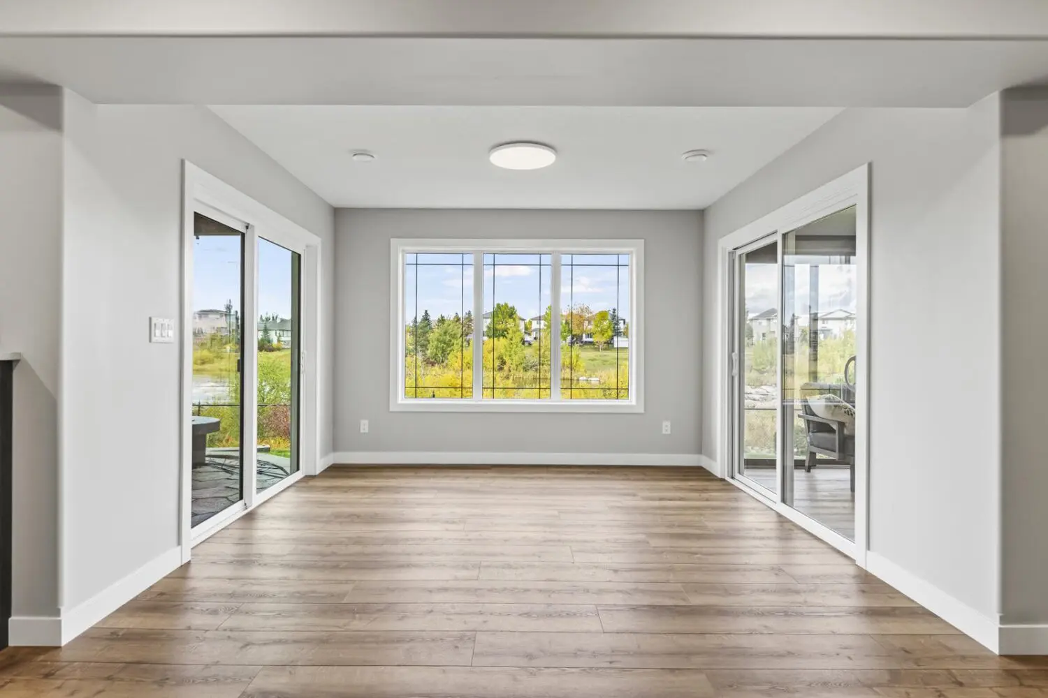 finished Newbury Court basement renovation showcases open-concept layout with natural light and premium finishes